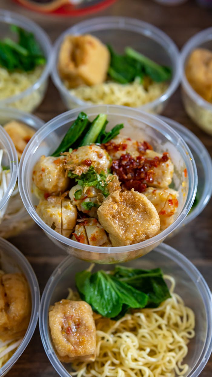 services-01 Savor the mouth-watering Indonesian street food with noodles, tofu, and spices.